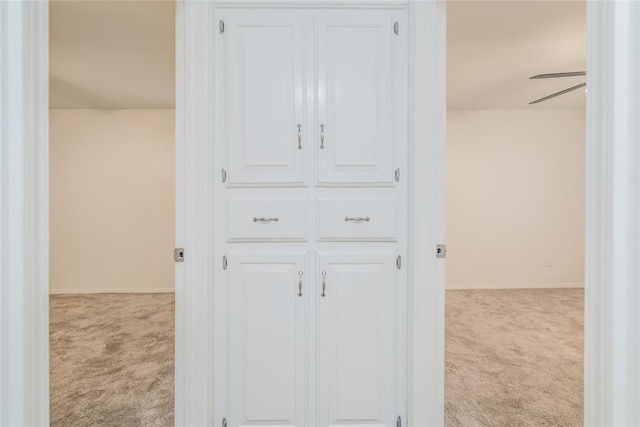7913 Debar Cir, Oklahoma City, OK 73132 - corridor featuring carpet