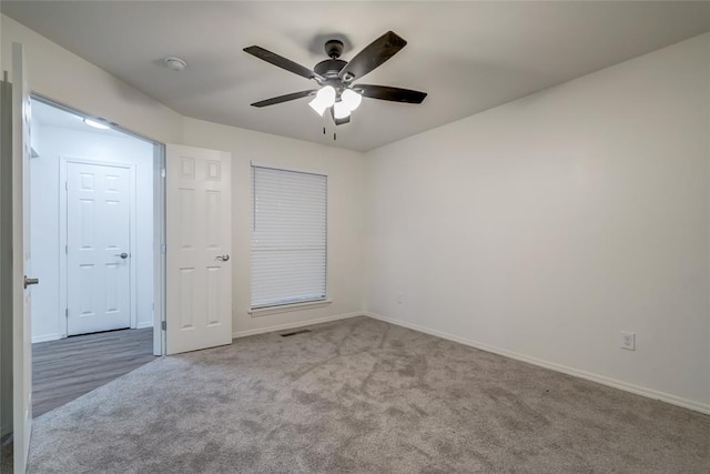 7913 Debar Cir, Oklahoma City, OK 73132 - unfurnished bedroom featuring carpet flooring and ceiling fan