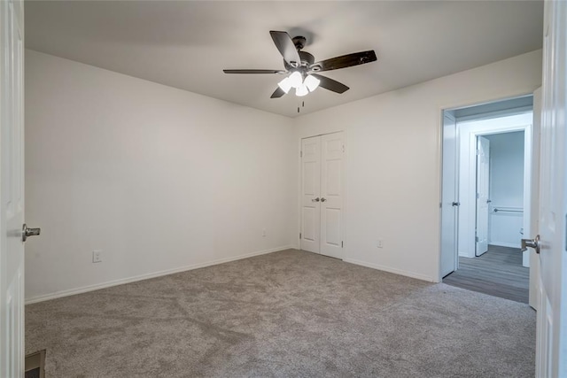 7913 Debar Cir, Oklahoma City, OK 73132 - unfurnished bedroom featuring carpet floors, a ceiling fan, and a closet