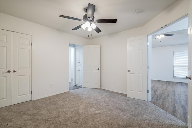 7913 Debar Cir, Oklahoma City, OK 73132 - unfurnished bedroom with carpet flooring, a closet, and ceiling fan