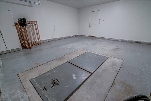 7913 Debar Cir, Oklahoma City, OK 73132 - garage with baseboards