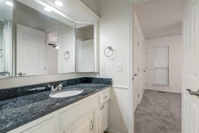 7913 Debar Cir, Oklahoma City, OK 73132 - bathroom featuring vanity and ceiling fan