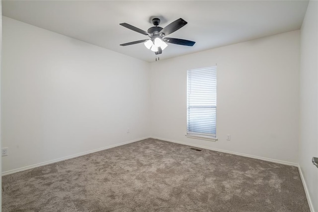 7913 Debar Cir, Oklahoma City, OK 73132 - empty room featuring carpet floors and ceiling fan