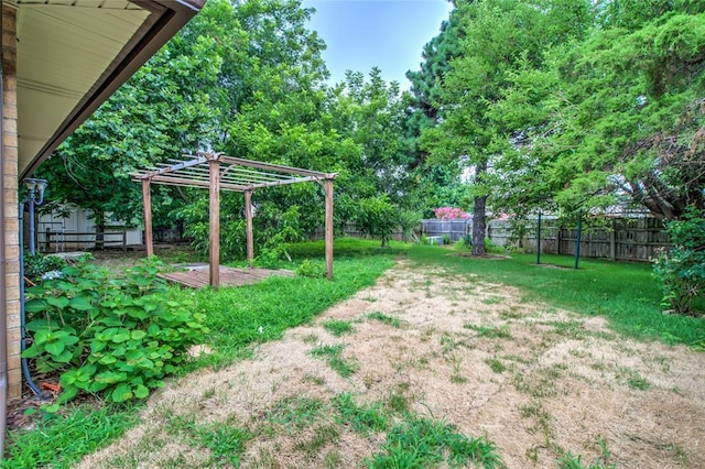 7913 Debar Cir, Oklahoma City, OK 73132 - fenced backyard with a pergola