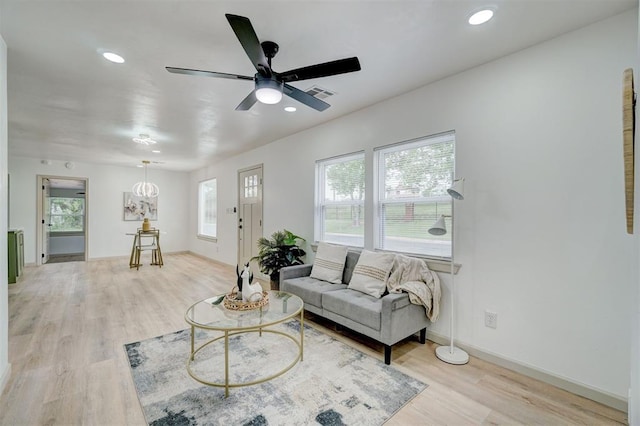 800 SW 26th St, Oklahoma City, OK 73109 - living area featuring light wood-type flooring, a ceiling fan, recessed lighting, and radiator heating unit