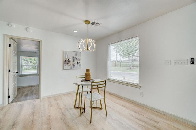 800 SW 26th St, Oklahoma City, OK 73109 - dining area with light wood-style floors, a chandelier, and recessed lighting