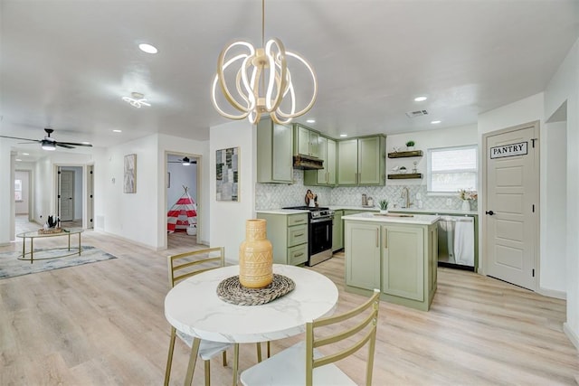 800 SW 26th St, Oklahoma City, OK 73109 - kitchen with green cabinetry, stainless steel appliances, under cabinet range hood, open shelves, and light countertops
