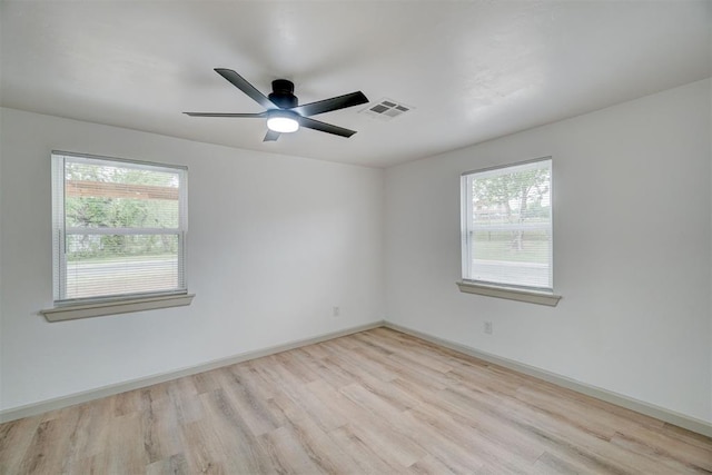 800 SW 26th St, Oklahoma City, OK 73109 - unfurnished room with plenty of natural light, wood finished floors, and ceiling fan