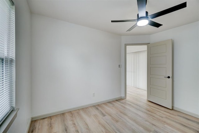 800 SW 26th St, Oklahoma City, OK 73109 - unfurnished room featuring light wood-style flooring, plenty of natural light, and a ceiling fan