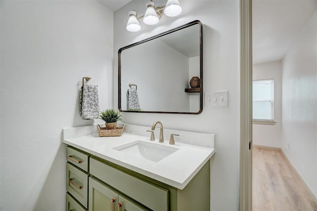 800 SW 26th St, Oklahoma City, OK 73109 - bathroom featuring vanity and wood finished floors