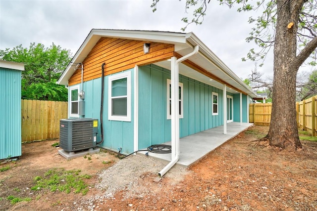 800 SW 26th St, Oklahoma City, OK 73109 - view of property exterior featuring a fenced backyard and board and batten siding