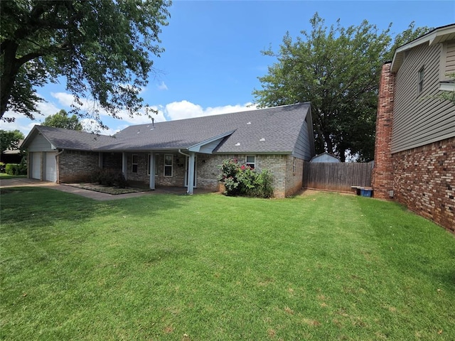 5621 NW 83rd St, Oklahoma City, OK 73132 - single story home featuring a garage, brick siding, and a shingled roof
