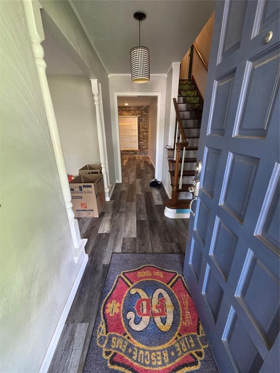5621 NW 83rd St, Oklahoma City, OK 73132 - entrance foyer with dark wood-style floors and stairs