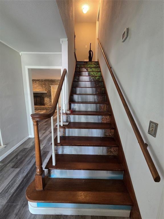 5621 NW 83rd St, Oklahoma City, OK 73132 - stairs featuring wood finished floors and ornamental molding