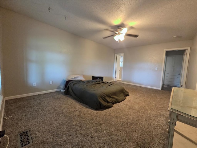 5621 NW 83rd St, Oklahoma City, OK 73132 - bedroom with a textured ceiling, carpet floors, and ceiling fan