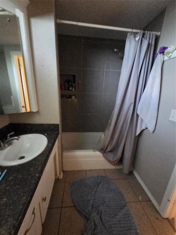 5621 NW 83rd St, Oklahoma City, OK 73132 - full bath with vanity, a stall shower, and tile patterned floors