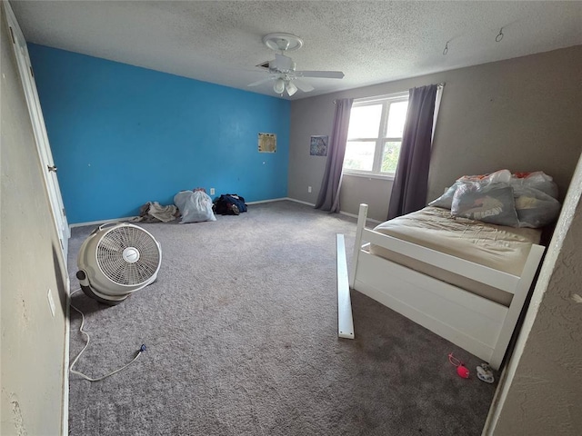 5621 NW 83rd St, Oklahoma City, OK 73132 - bedroom with carpet floors, a textured ceiling, and ceiling fan