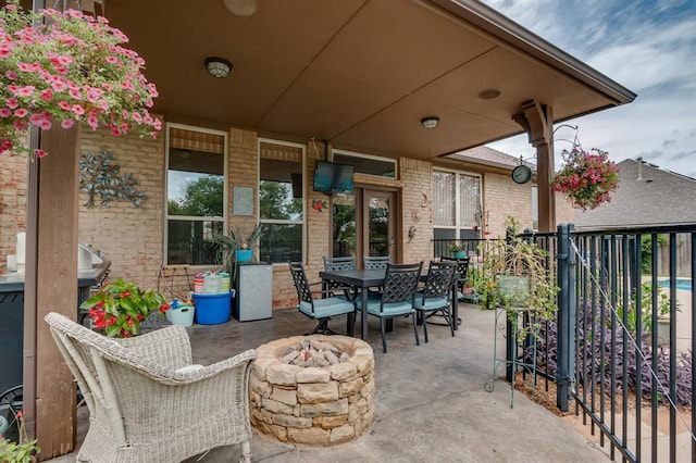 16204 Old Olive Way, Edmond, OK 73013 - view of patio / terrace with an outdoor fire pit and outdoor dining area