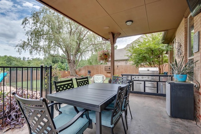 16204 Old Olive Way, Edmond, OK 73013 - fenced backyard with outdoor dining space, a patio area, and a grill