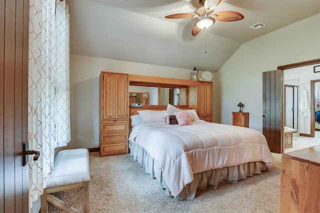16204 Old Olive Way, Edmond, OK 73013 - bedroom with lofted ceiling, light carpet, and ceiling fan