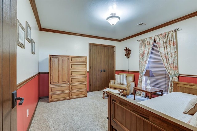 16204 Old Olive Way, Edmond, OK 73013 - bedroom featuring carpet, wainscoting, crown molding, and wooden walls