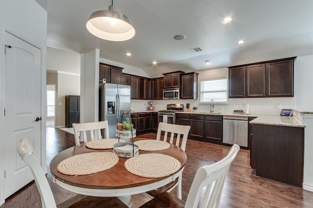11316 NW 94th St, Yukon, OK 73099 - dining area with wood finished floors and vaulted ceiling