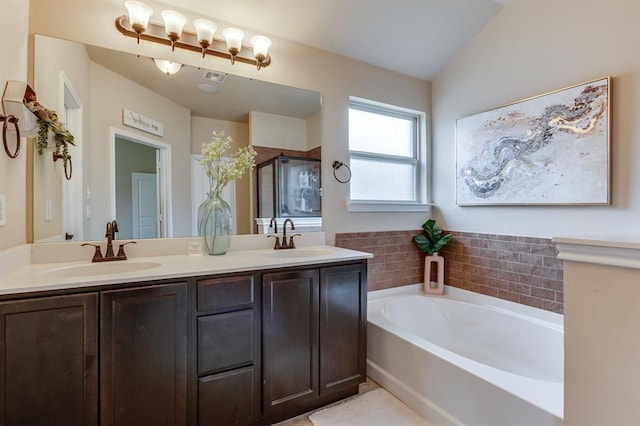 11316 NW 94th St, Yukon, OK 73099 - bathroom with a bath, a shower stall, and double vanity