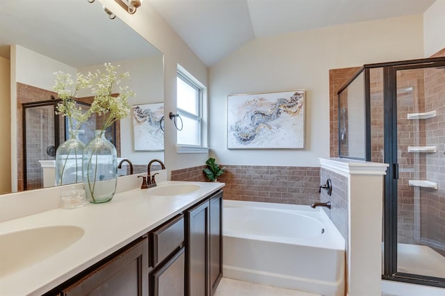 11316 NW 94th St, Yukon, OK 73099 - bathroom with a garden tub, a shower stall, vaulted ceiling, and double vanity