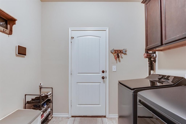 11316 NW 94th St, Yukon, OK 73099 - laundry area with cabinet space and separate washer and dryer