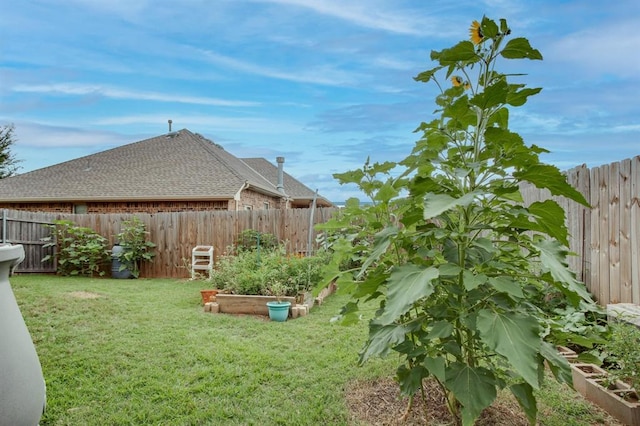 9124 NW 90th Cir, Yukon, OK 73099 - fenced backyard with a garden