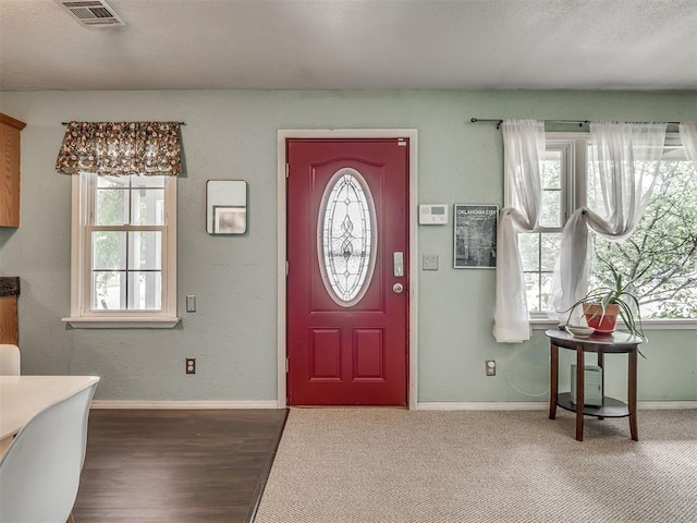 2028 Carlisle Rd, The Village, OK 73120 - entryway with healthy amount of natural light and wood finished floors
