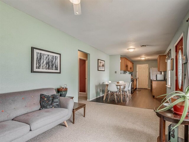 2028 Carlisle Rd, The Village, OK 73120 - living area featuring carpet floors