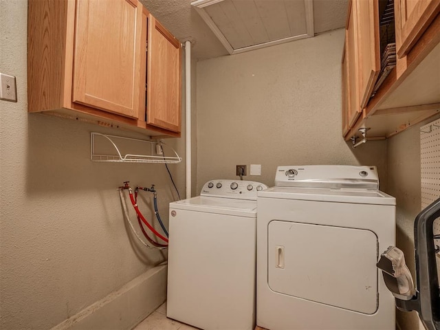 2028 Carlisle Rd, The Village, OK 73120 - laundry area featuring cabinet space and washing machine and dryer