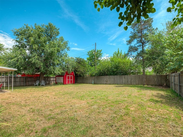 2028 Carlisle Rd, The Village, OK 73120 - fenced backyard with a storage unit