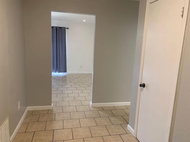 2928 N Downing Ave, Bethany, OK 73008 - spare room featuring tile patterned flooring and baseboards