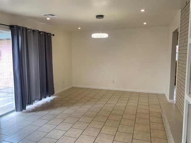 2928 N Downing Ave, Bethany, OK 73008 - empty room with plenty of natural light, recessed lighting, and light tile patterned flooring