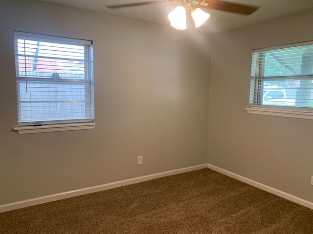 2928 N Downing Ave, Bethany, OK 73008 - carpeted spare room featuring ceiling fan and plenty of natural light
