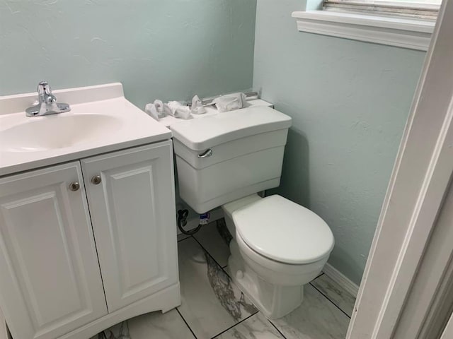 2928 N Downing Ave, Bethany, OK 73008 - bathroom featuring marble look tiles and vanity