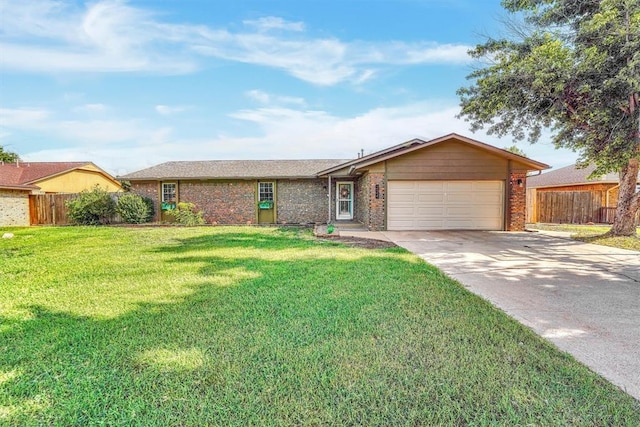 224 N Quail Run, Altus, OK 73521 - ranch-style house featuring brick siding, an attached garage, and driveway