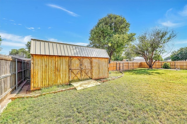 224 N Quail Run, Altus, OK 73521 - fenced backyard featuring a storage shed