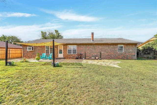 224 N Quail Run, Altus, OK 73521 - back of house with a patio area and brick siding