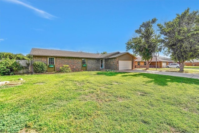 224 N Quail Run, Altus, OK 73521 - ranch-style home featuring driveway, an attached garage, and brick siding