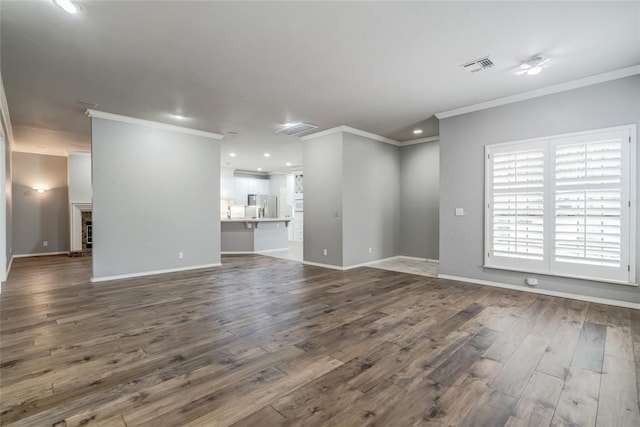 1900 NW 159th Pl, Edmond, OK 73013 - unfurnished living room featuring crown molding, dark wood-type flooring, recessed lighting, and a ceiling fan