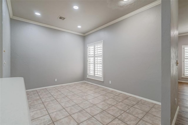 1900 NW 159th Pl, Edmond, OK 73013 - empty room featuring crown molding, light tile patterned floors, and recessed lighting