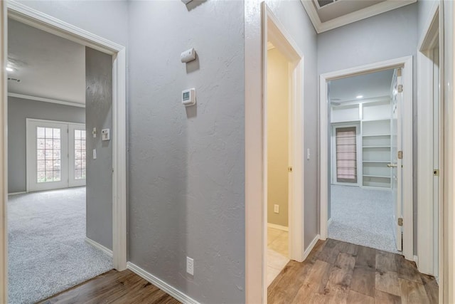 1900 NW 159th Pl, Edmond, OK 73013 - hall with crown molding, wood finished floors, and carpet floors