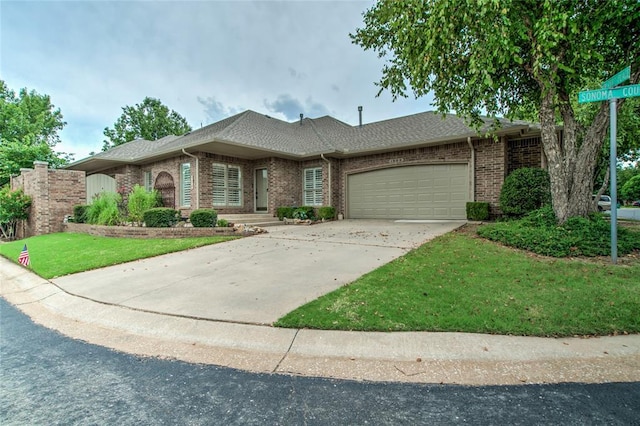 1900 NW 159th Pl, Edmond, OK 73013 - ranch-style house featuring an attached garage, driveway, brick siding, a front yard, and a shingled roof