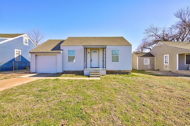 2132 N Rhode Island Ave, Oklahoma City, OK 73111 - view of front of home with an attached garage, concrete driveway, and a shingled roof