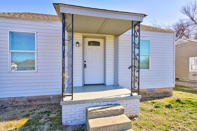 2132 N Rhode Island Ave, Oklahoma City, OK 73111 - doorway to property with a shingled roof and crawl space