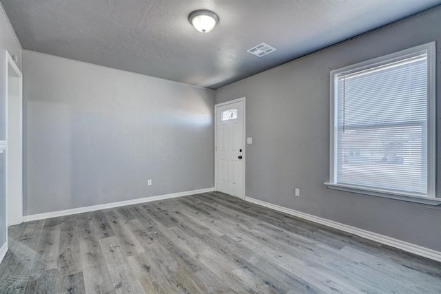 2132 N Rhode Island Ave, Oklahoma City, OK 73111 - foyer with wood finished floors and baseboards