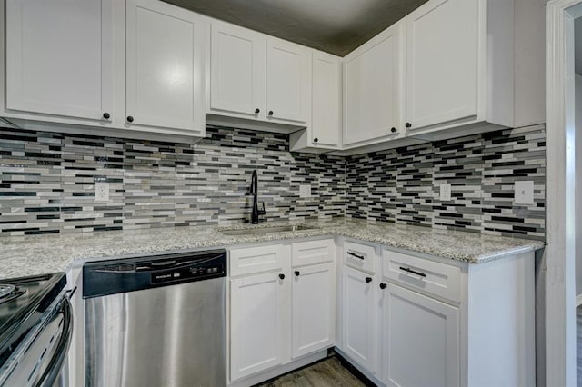 2132 N Rhode Island Ave, Oklahoma City, OK 73111 - kitchen featuring dishwasher, black range with electric cooktop, tasteful backsplash, and white cabinets